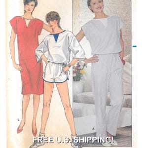 May include: A sewing pattern featuring three different styles of clothing: a red dress, a white top with blue trim and white shorts, and a gray jumpsuit. The pattern includes instructions for sizes 6-14.