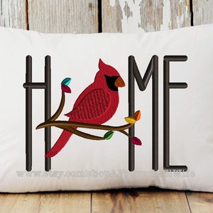 May include: White pillow with the word "HOME" embroidered in black with a red cardinal perched on a branch with colorful leaves. The text "www.etsy.com/shop/APowerhouseWife" is embroidered at the bottom.