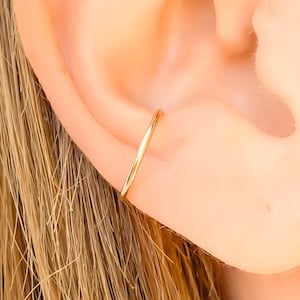 Solid gold conch sale earring