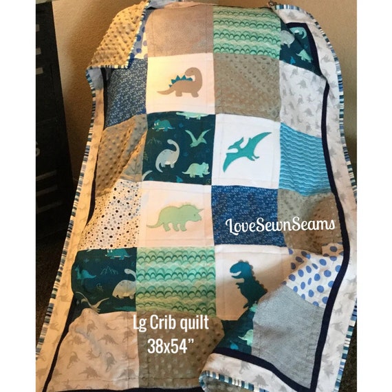 dinosaur cot quilt