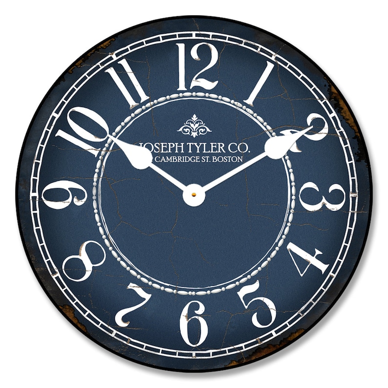 May include: A blue and white distressed clock face with Roman numerals and a decorative flourish. The clock face reads "JOSEPH TYLER CO. CAMBRIDGE ST. BOSTON".