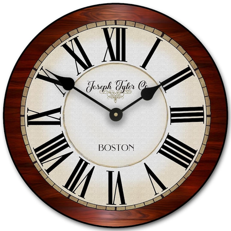 May include: A round wall clock with a dark brown wooden frame. The clock face is off-white with black Roman numerals and hands. The text "Joseph Tyler Co" and "BOSTON" are printed on the clock face.
