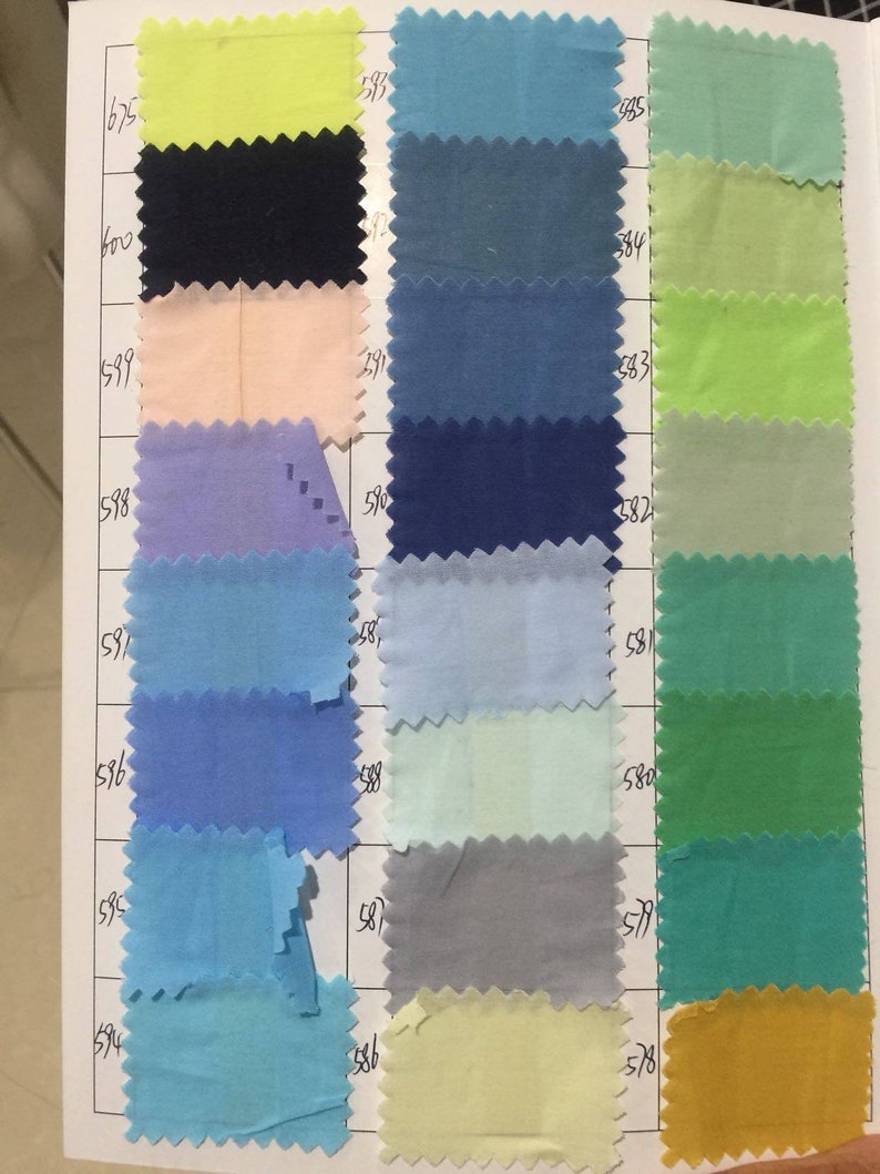 May include: A color chart with fabric swatches in various shades of blue, green, yellow, and pink. The swatches are numbered with the numbers 578, 579, 580, 581, 582, 583, 584, 585, 586, 587, 588, 589, 590, 591, 592, 593, 594, 595, 596, 597, 598, 599, 600, 625, 685, 785, 865, 965.