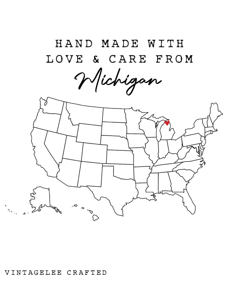 May include: A black and white outline map of the United States with a red heart over Michigan. The text "HAND MADE WITH LOVE & CARE FROM Michigan" is above the map. The text "VINTAGELEE CRAFTED" is below the map.