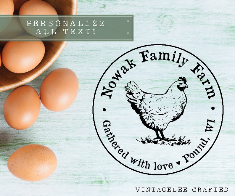 May include: A wooden bowl filled with brown eggs sits next to a circular stamp. The stamp features a hen illustration and the text "Nowak Family Farm, Gathered with love, Pound, WI". The text "Personalize All Text!" is also visible.
