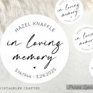 May include: White round labels with black text. The labels read "HAZEL KNAFFLE in loving memory" with dates 3.14.1944 - 3.28.2025. The text "VINTAGELEE CRAFTED" is at the bottom. The words "Printed Labels!" are also visible.