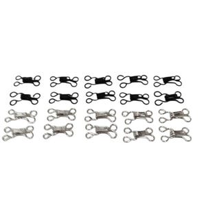 May include: A collection of twenty metal hook and eye fasteners arranged in four rows. The top two rows consist of ten black fasteners, while the bottom two rows feature ten silver-colored fasteners, each designed with a looped wire construction.