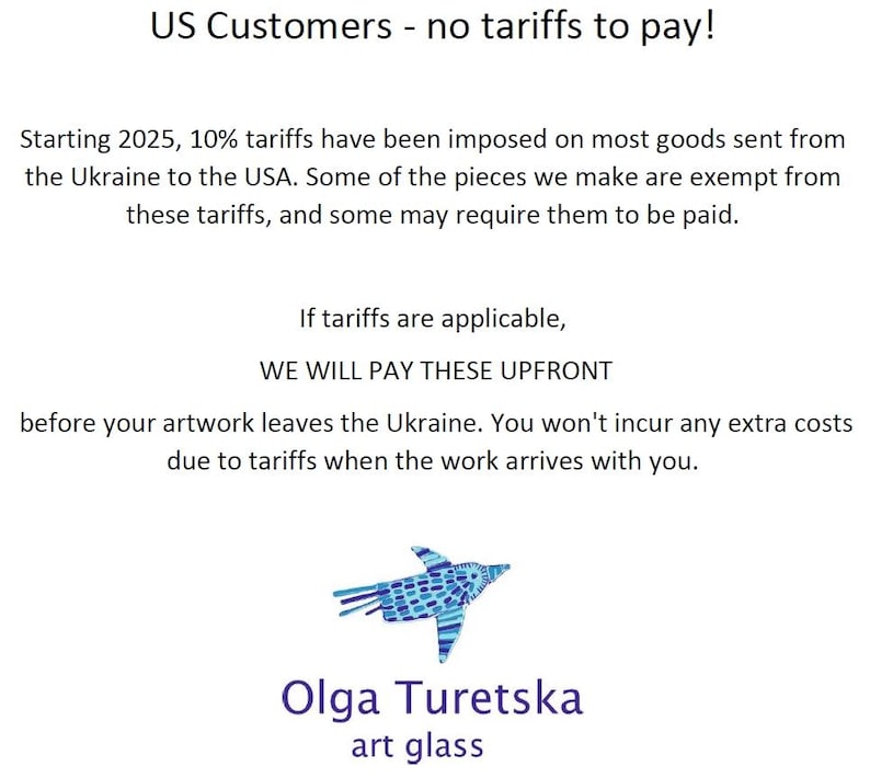 May include: Text on a white background states "US Customers - no tariffs to pay!" and explains tariff policies for goods from Ukraine. A blue and white bird illustration is featured, along with the text "Olga Turetska art glass."