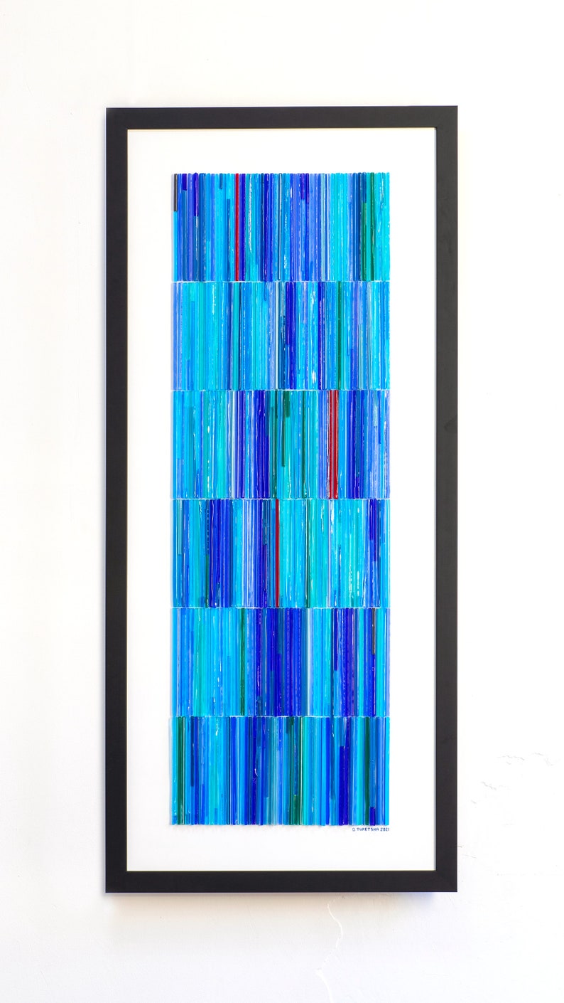 May include: A framed abstract artwork featuring a mosaic of blue, turquoise, and red glass pieces arranged in vertical lines.
