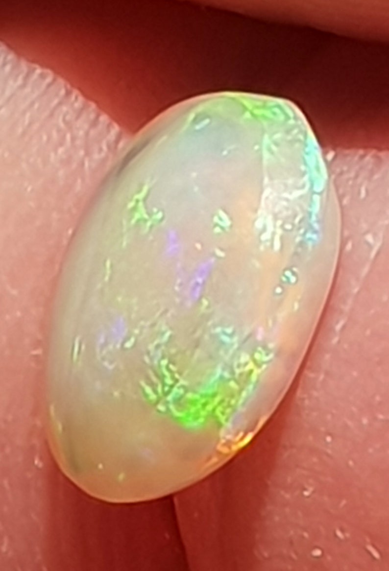 Oval Opal Cabochon from Lightning Ridge 13 x 10 mm approx.Item 1654