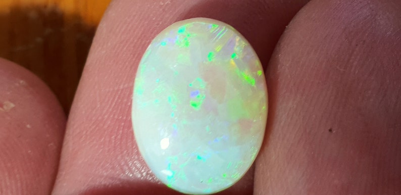 Oval Opal Cabochon from Lightning Ridge 13 x 10 mm approx.Item 1654