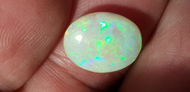 Oval Opal Cabochon from Lightning Ridge 13 x 10 mm approx.Item 1654
