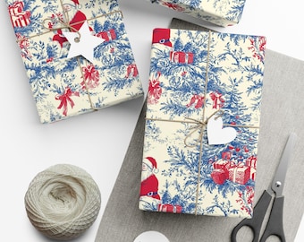 Papel de regalo navideño de Toile: Diseño de Papá Noel rojo y azul para un envoltorio de regalos elegante