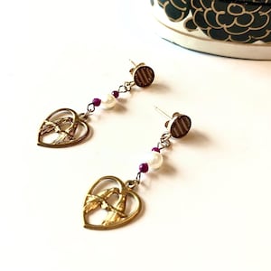 Pendientes vintage con dije de pajaritos enamorados y cuerda de guitarra