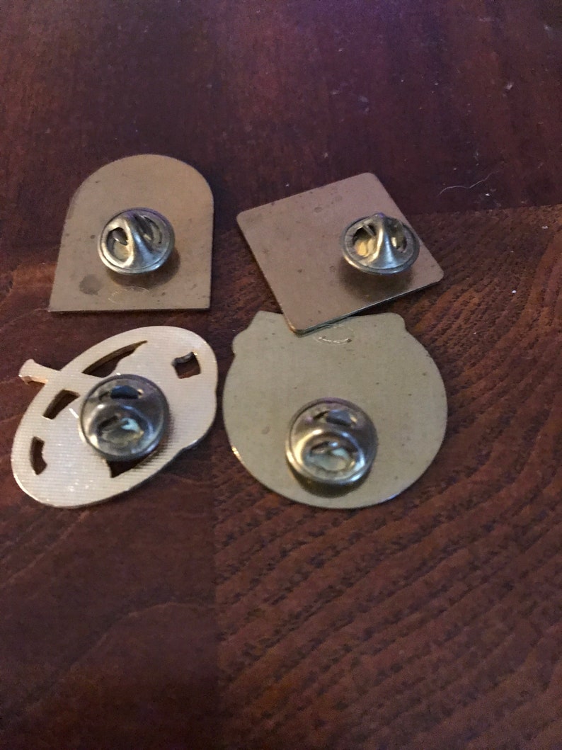 Four Game pins