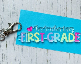 Teacher Keychain Charm | First Grade Teacher Charm | This Teacher Loves 1st Grade | Acrylic Charm for Keys, Zippers, Lanyards
