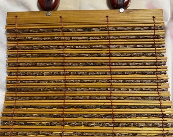 Vintage top handle slatted handbag made of wood and sticks with yellow silk lining