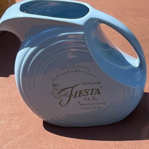 Vintage Fiesta 60th Anniversary Periwinkle Disc pitcher and four tumblers