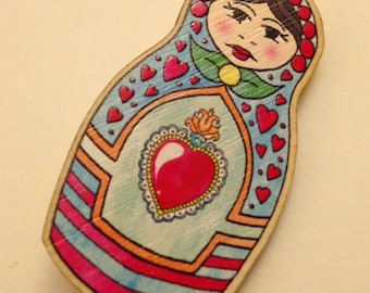 Broche de muñeca rusa