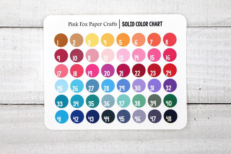 May include: A color chart with 48 different colored circles, numbered 1 through 48. The chart is labeled "Pink Fox Paper Crafts SOLID COLOR CHART".