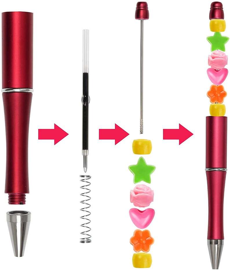 May include: A disassembled red pen with silver accents, showing the components: tip, barrel, ink cartridge, spring, and decorative beads. The beads are yellow, green, pink, and orange, in star, flower, heart, and round shapes. The pen is shown assembled.
