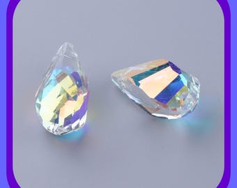 May include: Two clear, faceted crystal pendants shaped like teardrops. Each piece features an iridescent finish that reflects light in shades of blue, yellow, and pink, creating a prismatic effect across the geometric surfaces of the glass.