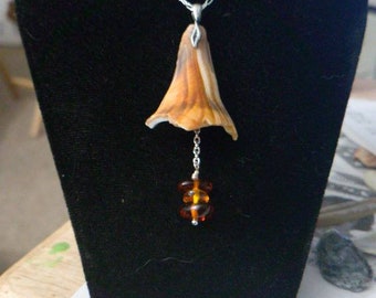 Conch Shell and Amber Pendant