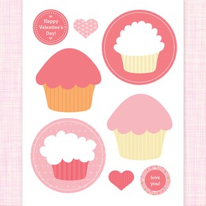 May include: Pink and white cupcake themed Valentine's Day stickers with the text "Happy Valentine's Day!" and "love you!"