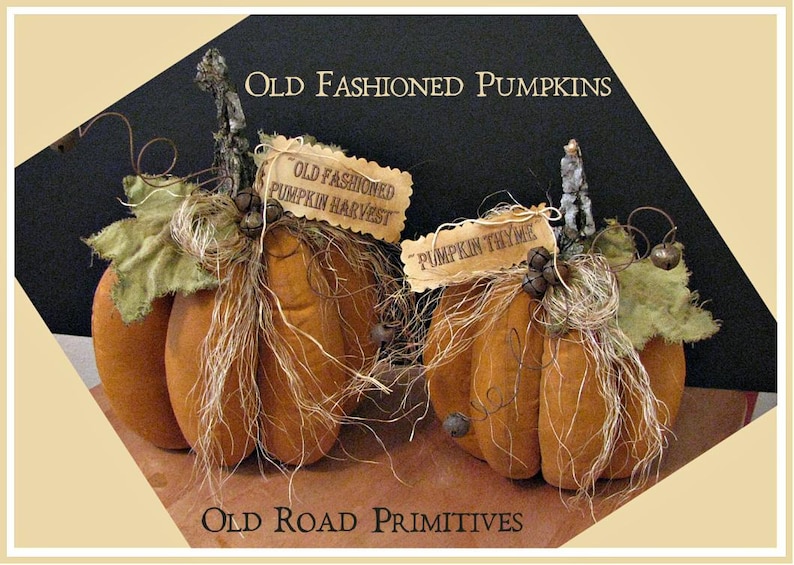 May include: Two handmade fabric pumpkins with burlap accents and vintage-style tags that read "Old Fashioned Pumpkin Harvest" and "Pumpkin Thyme".