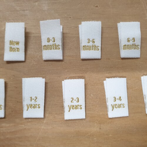 100 Gold text White Children Kids Babies Clothing Garment Sizes Woven Labels - From New Born to Age 15 years