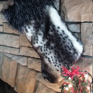 Luxury Faux Fur Christmas Stocking: Black, Gray, and White with Fur Ball Trim