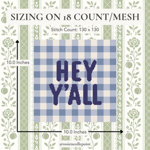 May include: A needlepoint pattern featuring a blue and white gingham check background with the dark blue text HEY Y'ALL. The design includes sizing information for 18 count mesh, a stitch count of 130 x 130, and dimensions of 10.0 inches by 10.0 inches.