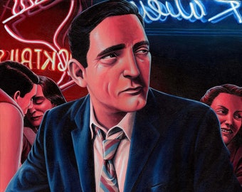 May include: A man in a blue suit and a striped tie sits at a bar with a can of DC Brau "The Corruption" India Pale Ale in his hand. He is looking off to the side, and there are other people in the background.
