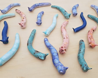 Ceramic slugs. Garden and terrarium decoration.