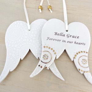 Personalised angel wings ornament with gold detail. Angel wings decoration. In memory of a special someone