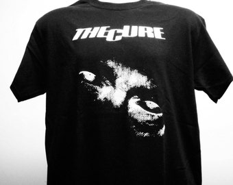 the cure merch