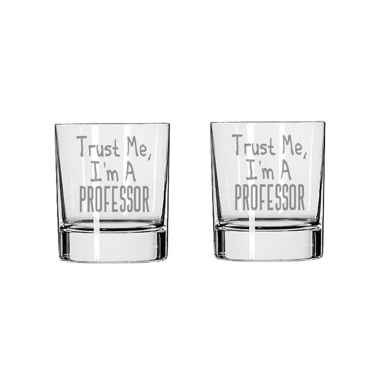 May include: Two clear glass tumblers with the text "Trust Me, I'm A Professor" etched on the front.