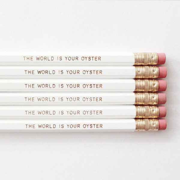 The World Is Your Oyster. Set of 6. White pencils with Gold Foil Text