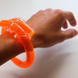 Neon Orange NUDO KNOT Bangle: Handmade Lucite Acrylic Bracelet