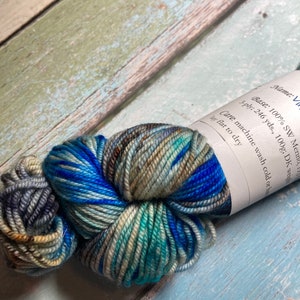 Vintage Flagstaff | DK weight variegated and speckled green and blue yarn for knitting, crochet, and weaving