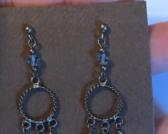 Sterling Silver And Light Blue Swarovski Crystal Dangl Earrings