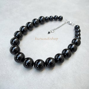 statement jewelry for black dress Earrings Matching Jewellery Jewellery Trends That Make Black Dresses Iconic 2026  Tyaani Jewelry to Wear with a