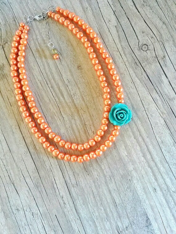 womens orange pearl