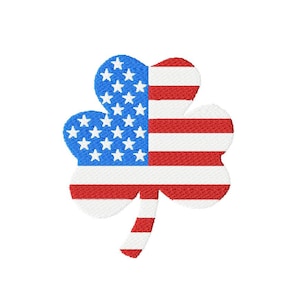 May include: A red, white, and blue American flag design in the shape of a four-leaf clover.