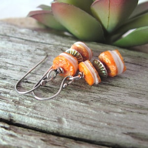 Spiny oyster earrings, orange spiney shell, sterling silver hogan beads, Navajo saucer pearls, old pawn finish, western southwestern jewelry