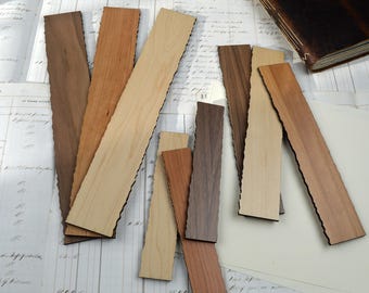 May include: A collection of wooden bookmarks in various shades of brown and tan. Each bookmark has a unique, natural edge. The bookmarks are arranged on a vintage paper background, suggesting a handcrafted or artisanal theme.