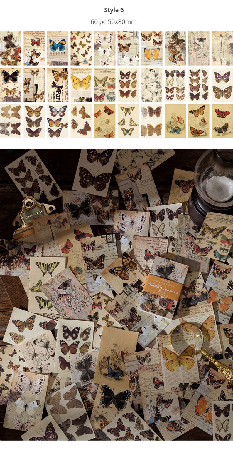 May include: A collection of vintage-style butterfly ephemera. The image shows a variety of butterfly illustrations in various colors, including orange, yellow, and brown, on aged paper. The text "Style 6" and "60 pc 50x80mm" is visible.