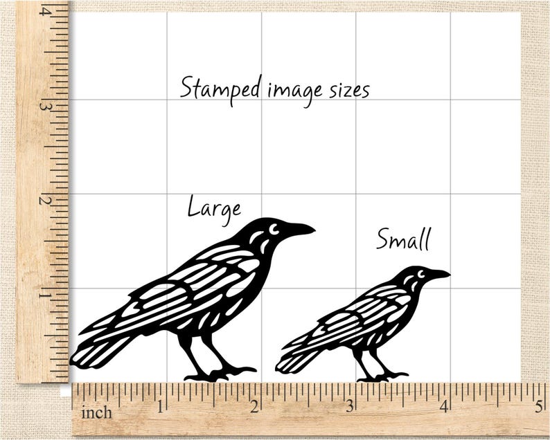 May include: Black raven silhouette designs labeled "Large" and "Small" on a grid, with a wooden ruler showing inch measurements. The text "Stamped image sizes" is written above the raven illustrations.