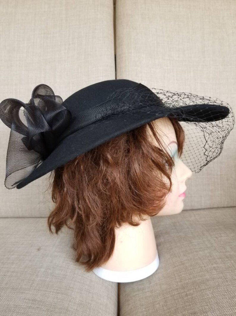 black broad brimmed hat