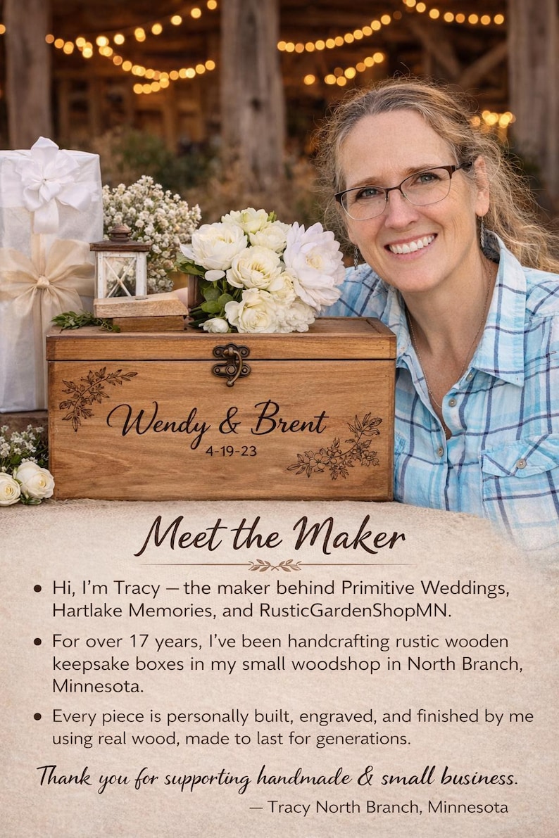 A woman is smiling and posing next to a wooden box with a floral design, surrounded by flowers and other decorative items.